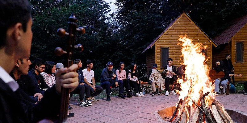 Campfire meeting with participants of the schoolchildren's cross country running competition